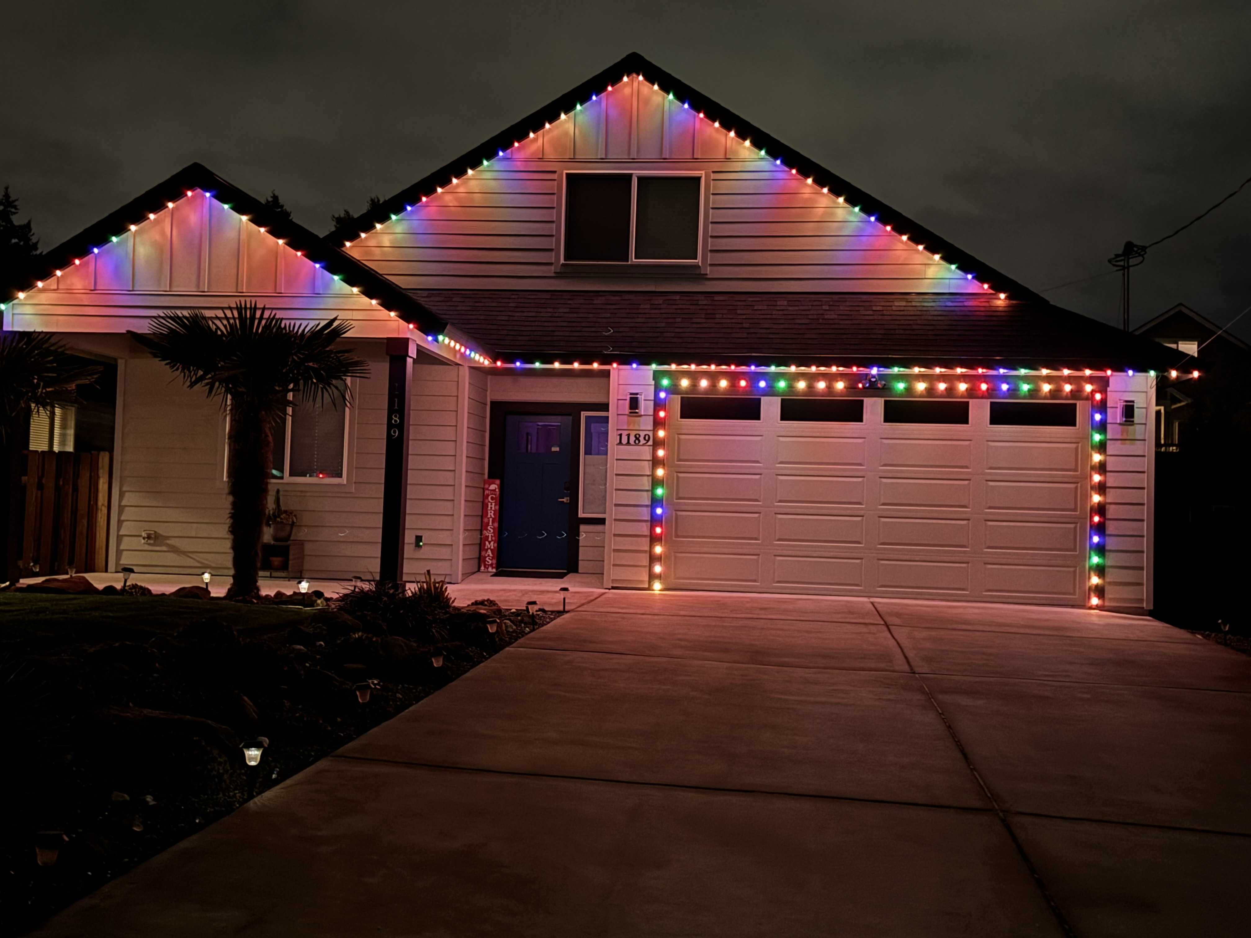 Home with LED roofline lighting at night